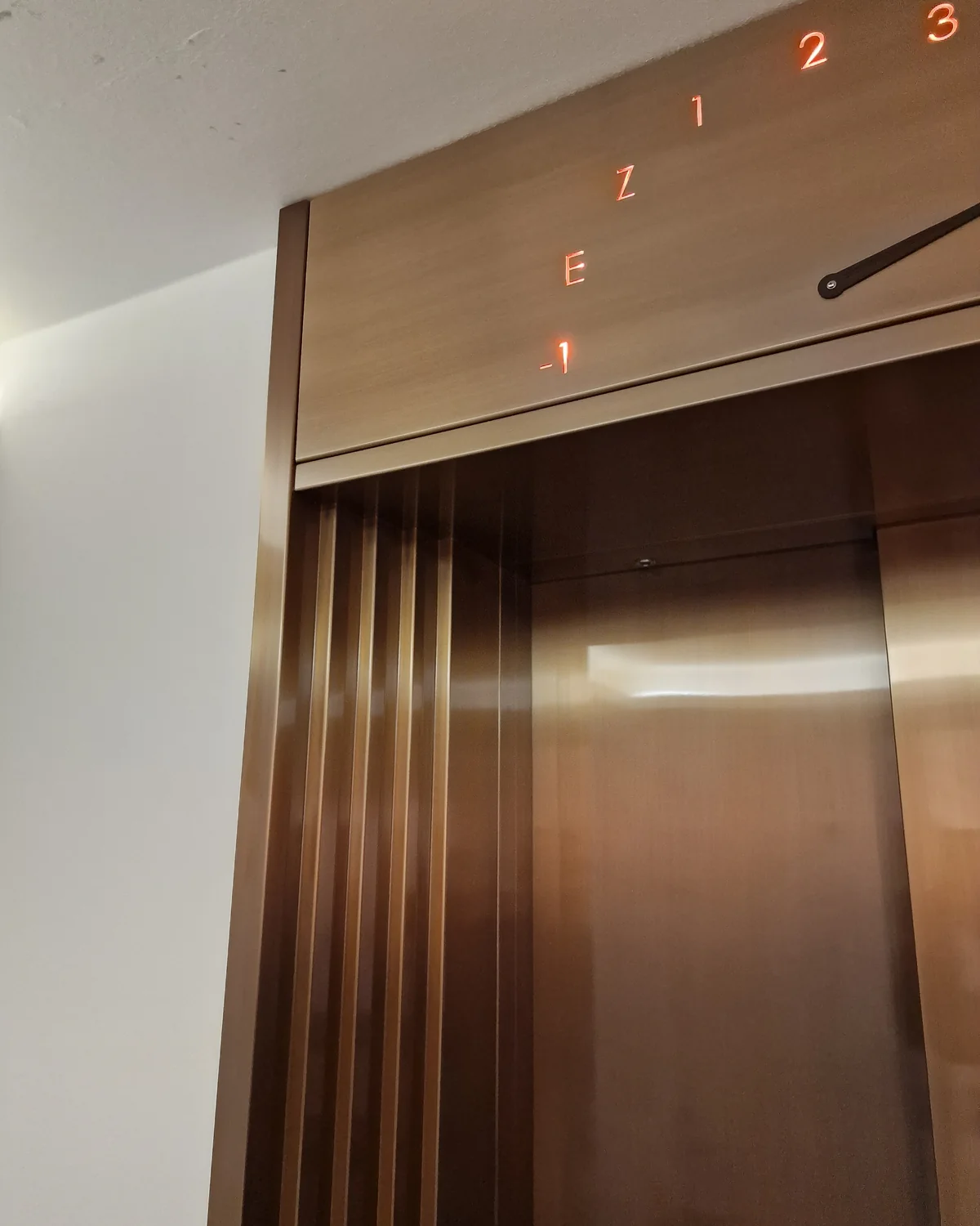 Illuminated semicircular floor indicator at project LV1891